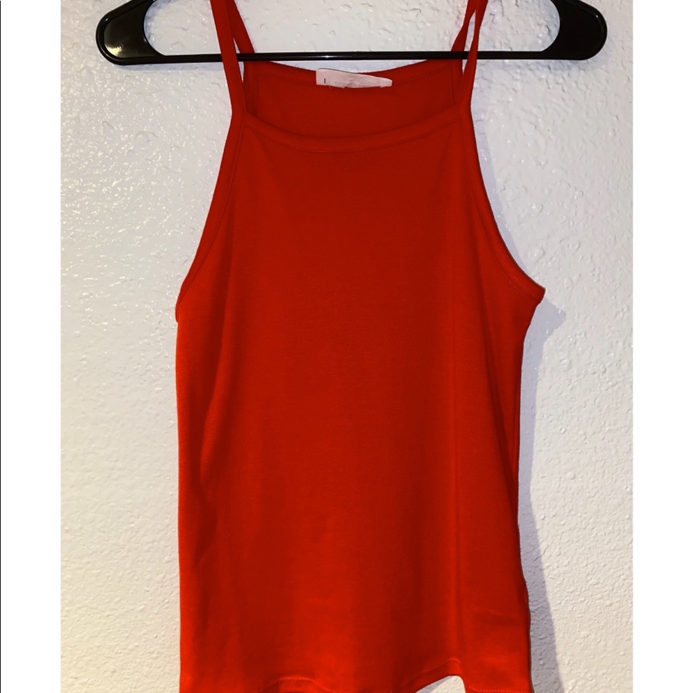 Red tank top. Bought from lane 201. Size M